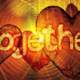 Stilisierte Herzen und ein Schriftzug "together"
