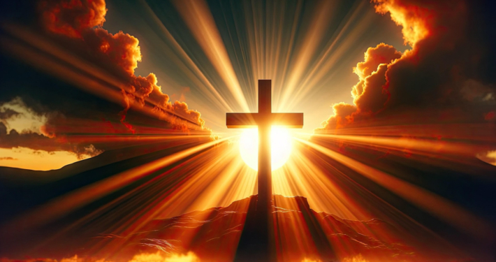 Ein Kreuz vor der untergehenden Sonne